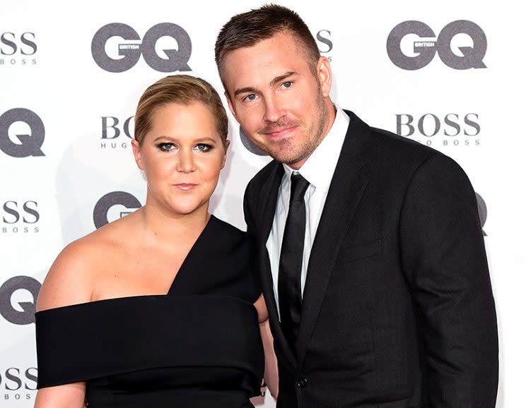 Amy Schumer has nothing to hide when it comes to her relationship with Ben Hanisch. (Photo: Jeff Spicer/Getty Images)
