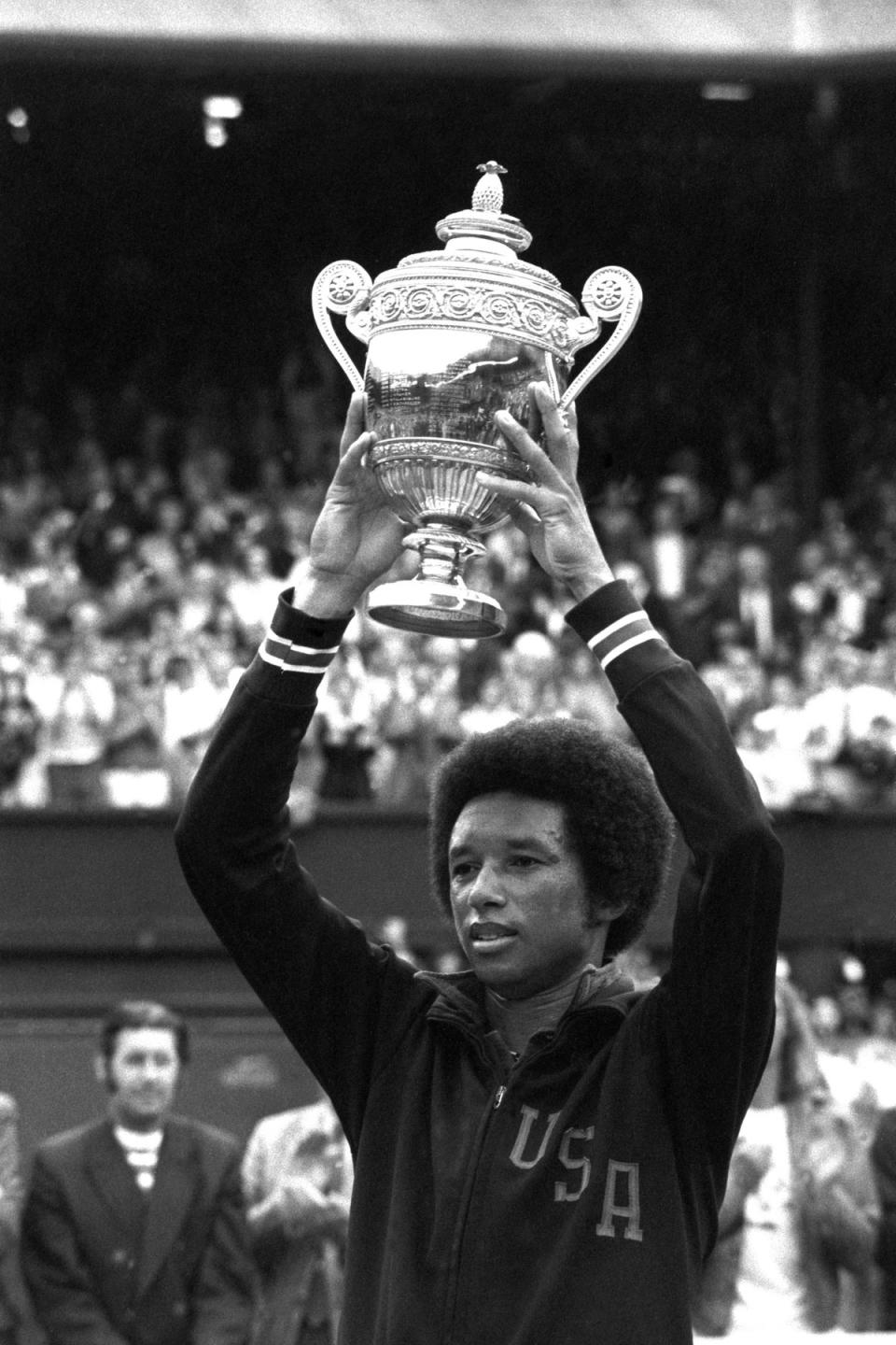 Arthur Ashe lifted his first Wimbledon title in 1975 (PA) (PA Archive)