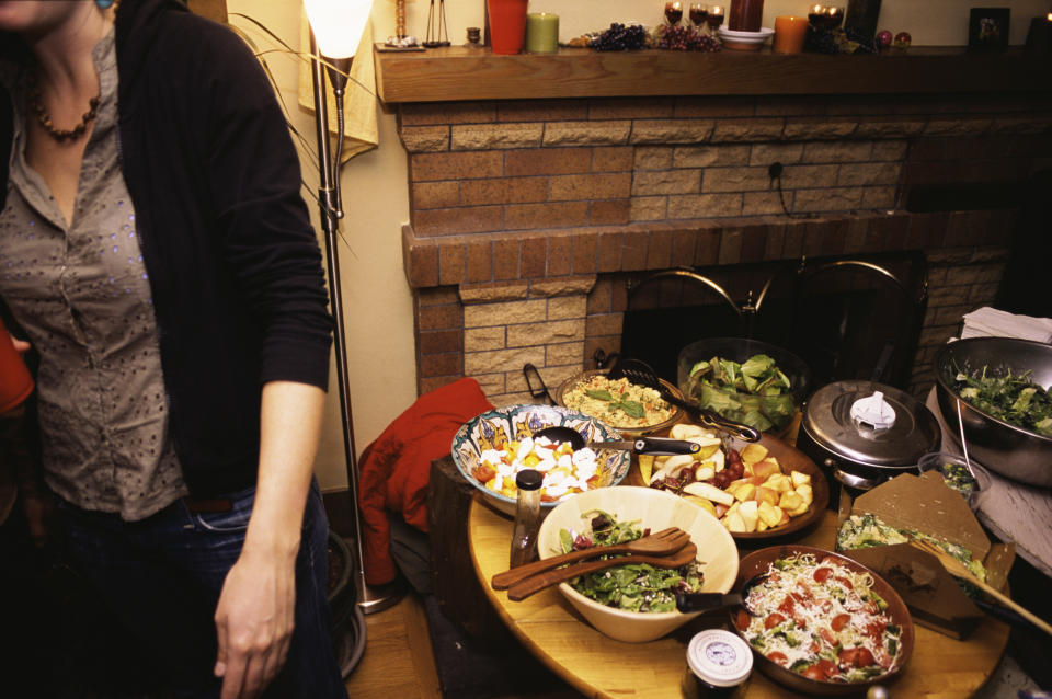 various side dishes scattered across a small communal table