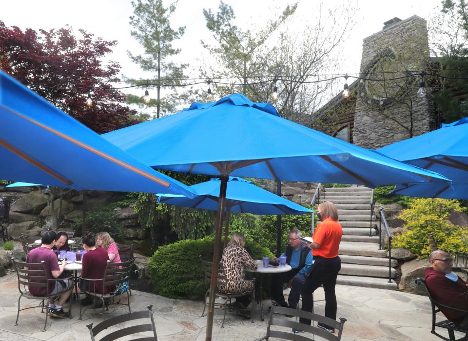 Diners eat on the patio of The Blue Canyon last year in Twinsburg.