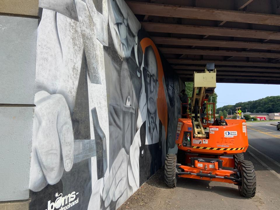 Gardner officials commissioned the City Mural Project to help beautify a part of the community that attracted unauthorized graffiti art and to stand as a testimony to the city's manufacturing history.