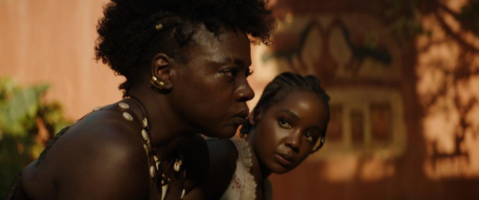 Viola Davis and Thuso Mbedu star in "The Woman King." Davis calls the journey to make the film a "day-to-day fight."