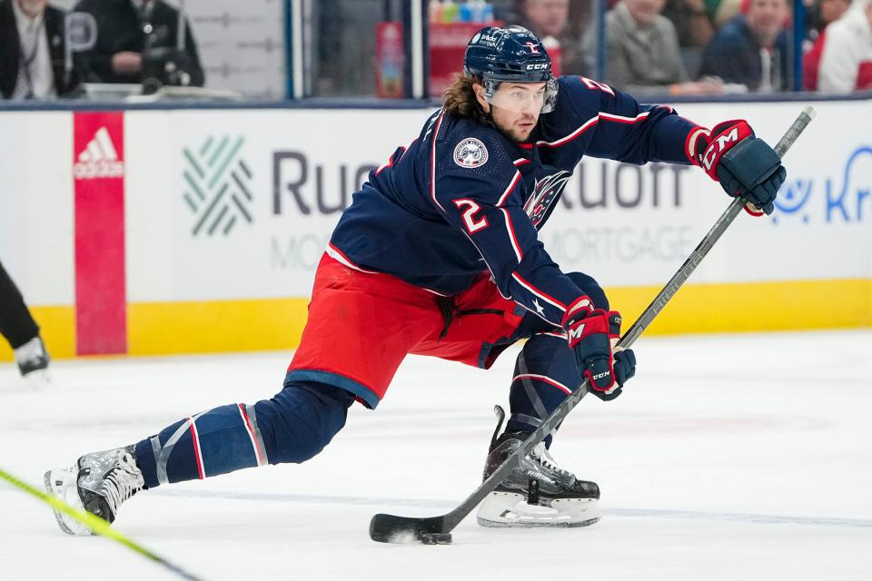 Nov 9, 2023; Columbus, Ohio, USA; Columbus Blue Jackets defenseman Andrew Peeke (2) passes the puck during the first period of the NHL hockey game against the Dallas Stars at Nationwide Arena.