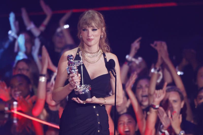 Taylor Swift holds one of her nine awards at the 2023 MTV Video Music Awards on September 12, 2023. She leads the MTV EMAs nominees with seven nominations. Photo by John Angelillo/UPI