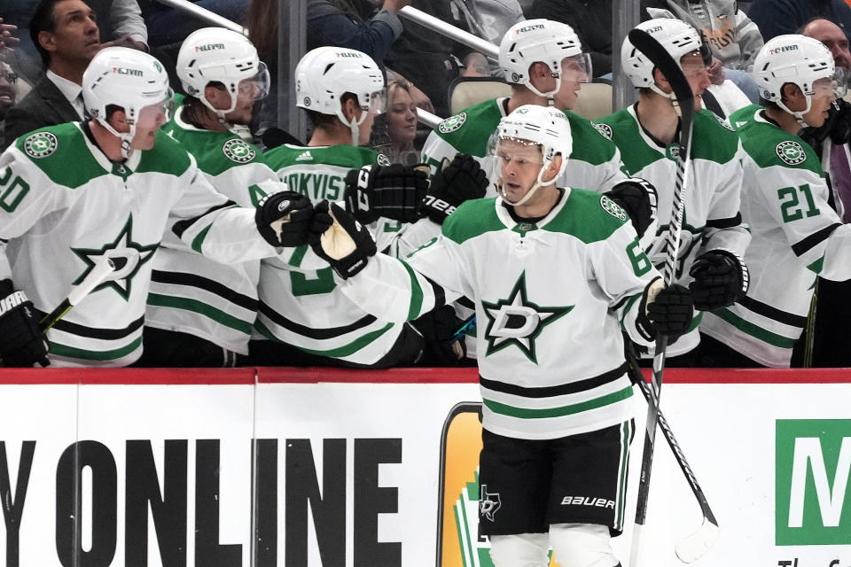 Dallas Stars' Evgenii Dadonov (63) returns to the bench after scoring against the Pittsburgh Penguins during the second period of an NHL hockey game in Pittsburgh, Tuesday, Oct. 24, 2023. (AP Photo/Gene J. Puskar)