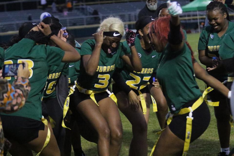 Hillsboro High's flag football team celebrates a 7-0 win over Overton in the first ever Metro Nashville Public School flag football championship game Friday, May 5, 2023 at Hillsboro High School in Nashville, Tennessee.