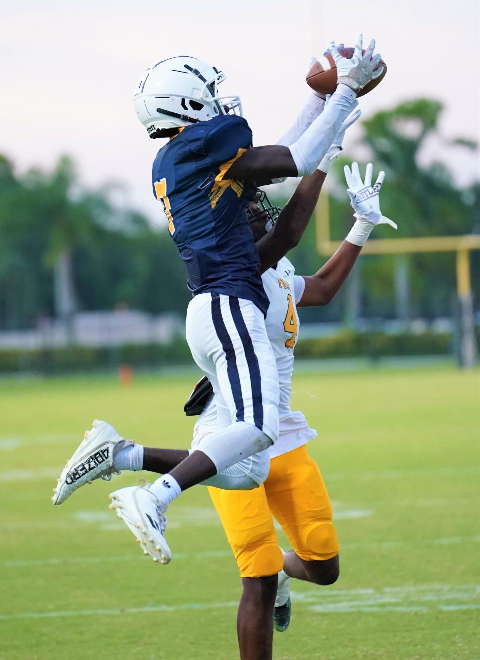 Tradition Prep's Zion Drummond catches a 24-yard touchdown in the second quarter against Yulee on Saturday, Sept. 23, 2023 in Port St. Lucie.