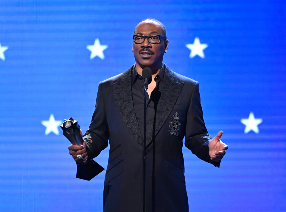 SANTA MONICA, CALIFORNIA - JANUARY 12: Eddie Murphy accepts the Lifetime Achievement Award onstage during the 25th Annual Critics' Choice Awards at Barker Hangar on January 12, 2020 in Santa Monica, California. (Photo by Amy Sussman/Getty Images)