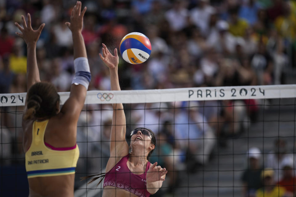 Brazilian women beat Latvia to join Canada in beach volleyball