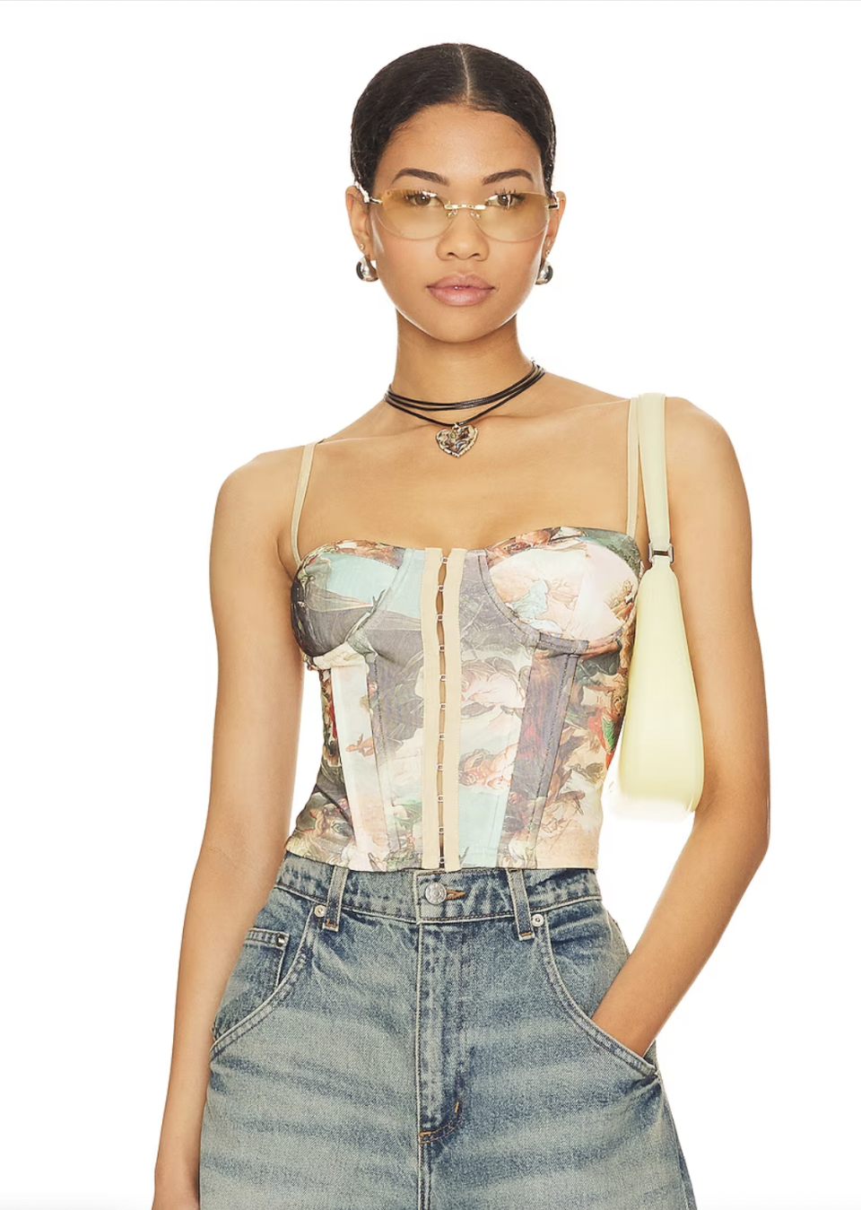 <p><a href="https://go.redirectingat.com?id=74968X1596630&url=https%3A%2F%2Fwww.revolve.com%2Fsuperdown-ziva-bustier-top-in-tan-multi%2Fdp%2FSPDW-WS1847%2F%3Fd%3DWomens%26page%3D1%26lc%3D37%26itrownum%3D82%26itcurrpage%3D1%26itview%3D05&sref=https%3A%2F%2F" rel="nofollow noopener" target="_blank" data-ylk="slk:Shop Now;elm:context_link;itc:0;sec:content-canvas" class="link ">Shop Now</a></p><p>Ziva Bustier Top</p><p>$68.00</p>