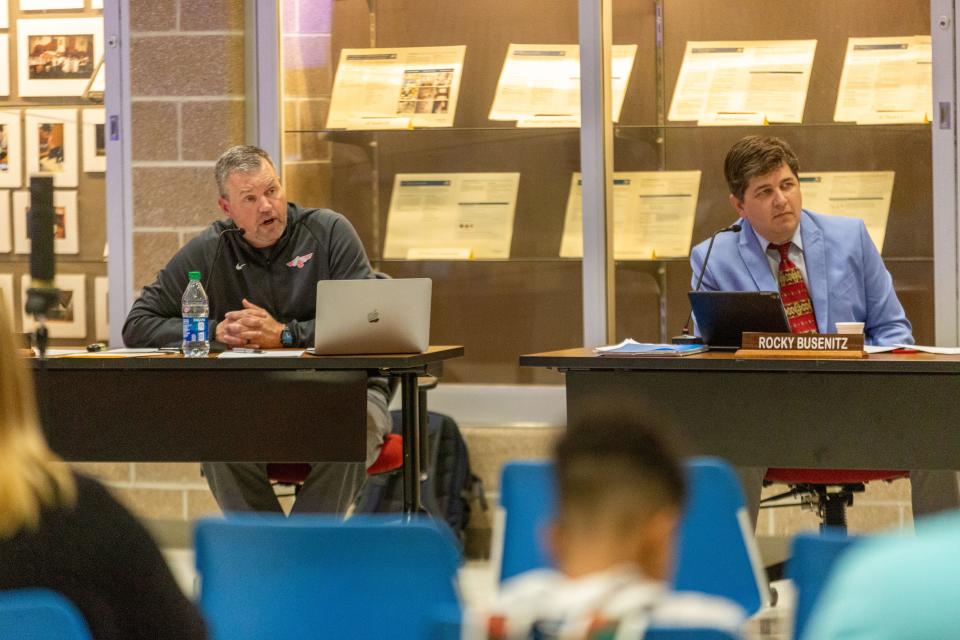 Shawnee Heights USD 450 superintendent Tim Hallacy explains the school board's policy and procedure for reviewing challenged books Monday in the district high school's south commons.