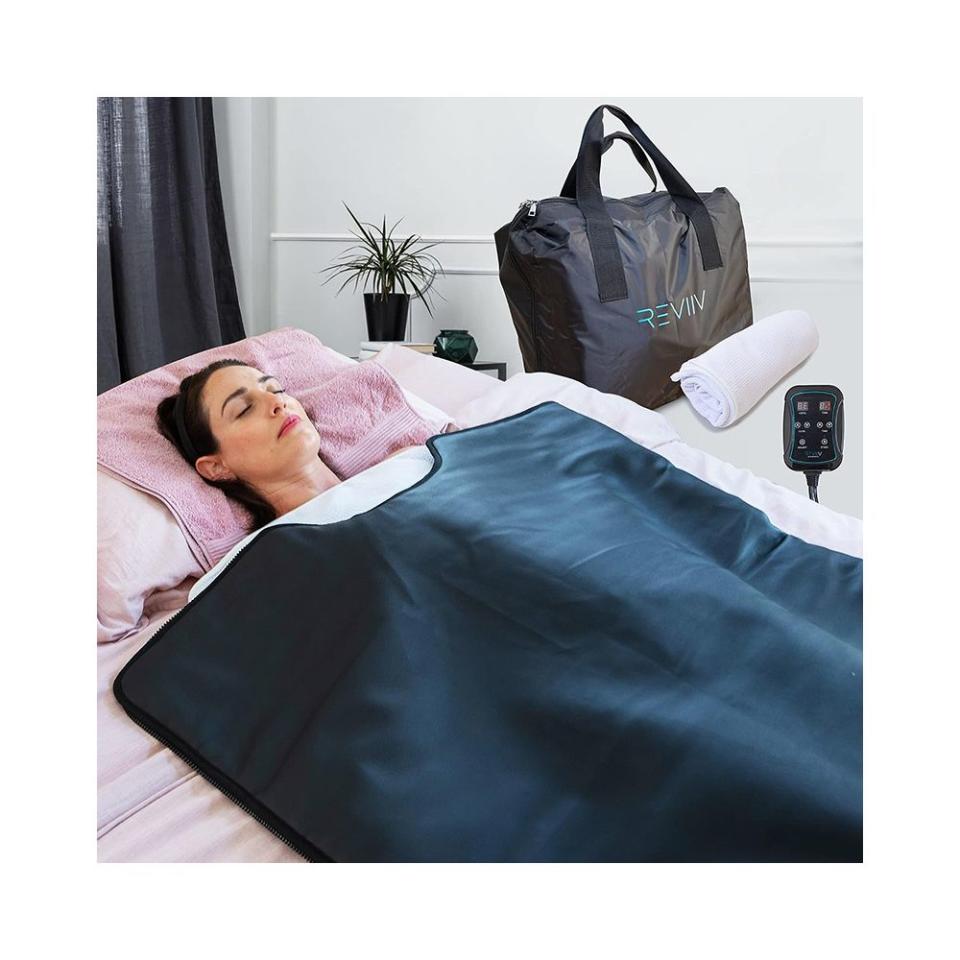 <p><a href="https://www.amazon.com/REVIIV-Infrared-Sauna-Blanket-Insert/dp/B0BH57D17Q?th=1&tag=syn-yahoo-20&ascsubtag=%5Bartid%7C10051.g.44841260%5Bsrc%7Cyahoo-us" rel="nofollow noopener" target="_blank" data-ylk="slk:Shop Now;elm:context_link;itc:0;sec:content-canvas" class="link ">Shop Now</a></p><p>Far Infrared Sauna Blanket</p><p>Amazon</p><p>$259.00</p><span class="copyright">Amazon</span>