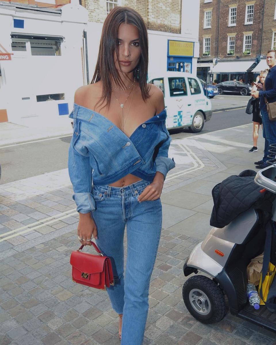 Emily Ratajkowski carrying the Iconic Emily Mini Bag in red. (Photo: Instagram/Emily Ratajowski)