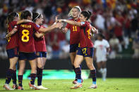 Spain's Lucía García, right, celebrates with her teammates after scoring against Switzerland during the women's Nations League group D soccer match between Spain and Switzerland at the Nuevo Arcangel stadium in Cordoba, Spain, Tuesday, Sept. 26, 2023. (AP Photo/Jose Breton)