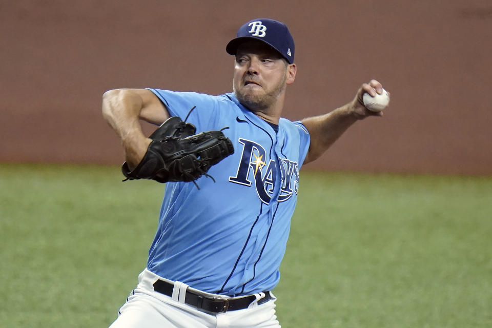 Tampa Bay Rays starting pitcher Rich Hill delivers to the Kansas City Royals during the first inning of a baseball game Tuesday, May 25, 2021, in St. Petersburg, Fla. (AP Photo/Chris O'Meara)
