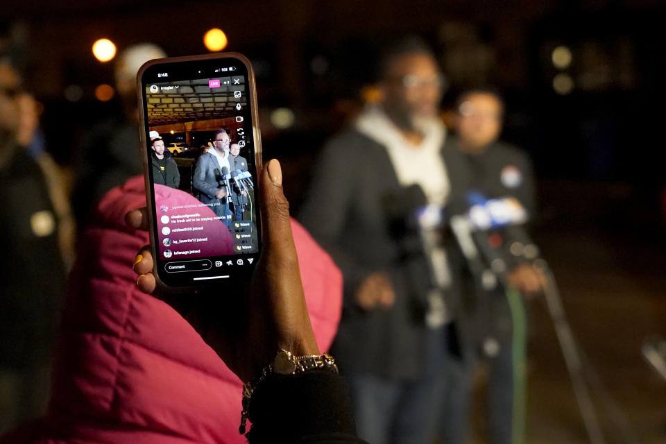 Brandon Johnson is live-streamed as he visits a homeless encampment under an interstate freeway.