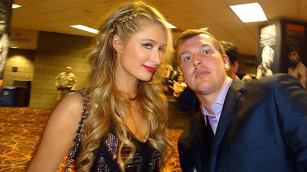 Steve Carruthers with Paris Hilton (SWNS.com)