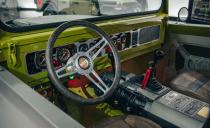 <p>The aluminum door panels and instrument panel were created with a water-jet make for style and lightening.</p>