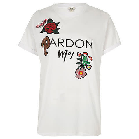 <p>White 'pardon moi' floral appliqué T-shirt. Available at <a rel="nofollow noopener" href="https://www.riverisland.com/p/white-pardon-moi-floral-appliqu-t-shirt-701698" target="_blank" data-ylk="slk:River Island - £24;elm:context_link;itc:0;sec:content-canvas" class="link ">River Island - £24</a></p>