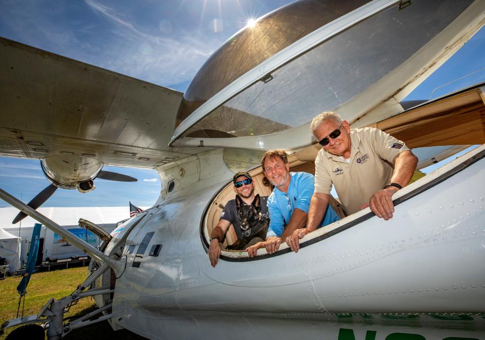 Pilot Blake Wild, pilot Jayson Owen and owner John O'Connor with their 1943 PBY at Lakeland Linder International Airport on Monday.