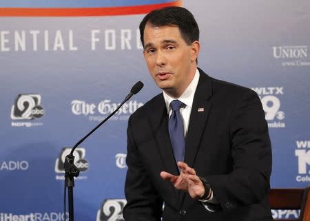 Republican U.S. presidential candidate and Wisconsin Governor Scott Walker participates in the Voters First Presidential Forum in Manchester, New Hampshire August 3, 2015. REUTERS/Brian Snyder