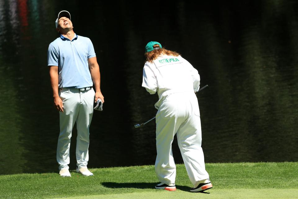 AUGUSTA, GEORGIA - APRIL 10: Brooks Koepka of the United States to a putt by his mother Denise Jakows during the Par 3 Contest prior to the Masters at Augusta National Golf Club on April 10, 2019 in Augusta, Georgia. (Photo by Mike Ehrmann/Getty Images)