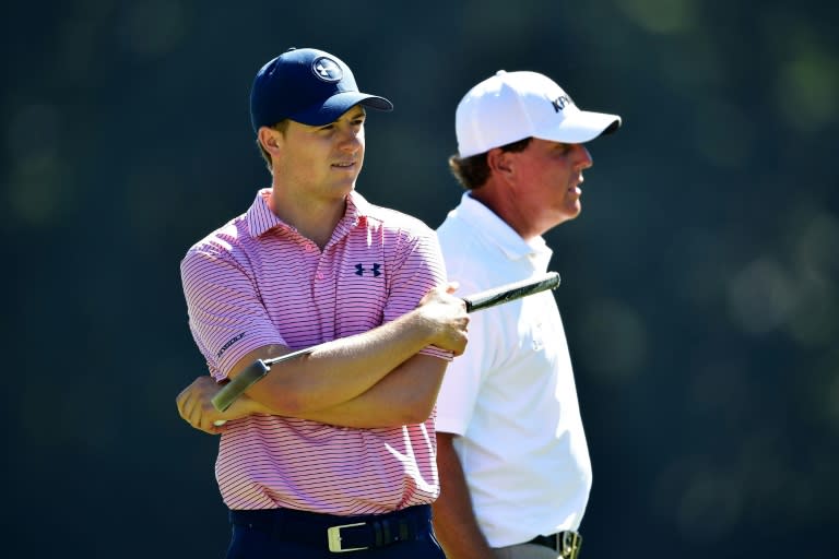 (L-R) Jordan Spieth of the United States waits alongside Phil Mickelson of the United States during a practice round prior to the 2016 PGA Championship at Baltusrol Golf Club on July 26, 2016 in Springfield, New Jersey