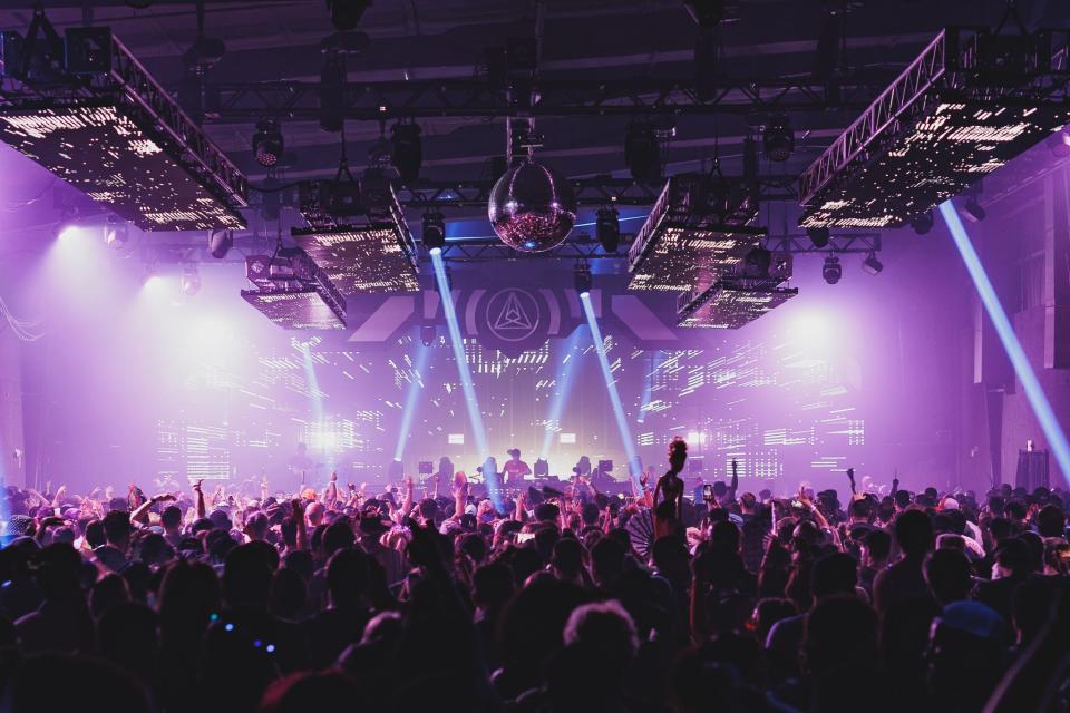 Crowds dance to the music at Seismic Dance Event 5.0. The two-stage bash will return to Concourse Project in Southeast Austin on Nov. 10-12.