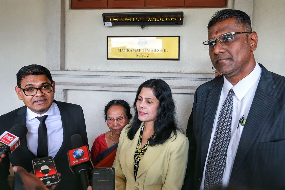 E. Meeriam Rosaline’s lawyers Ramesh Sivakumar (left)  and RSN Rayer (right) speak to members of the media at the Kuala Lumpur High Court February 18, 2020. — Picture by Ahmad Zamzahuri