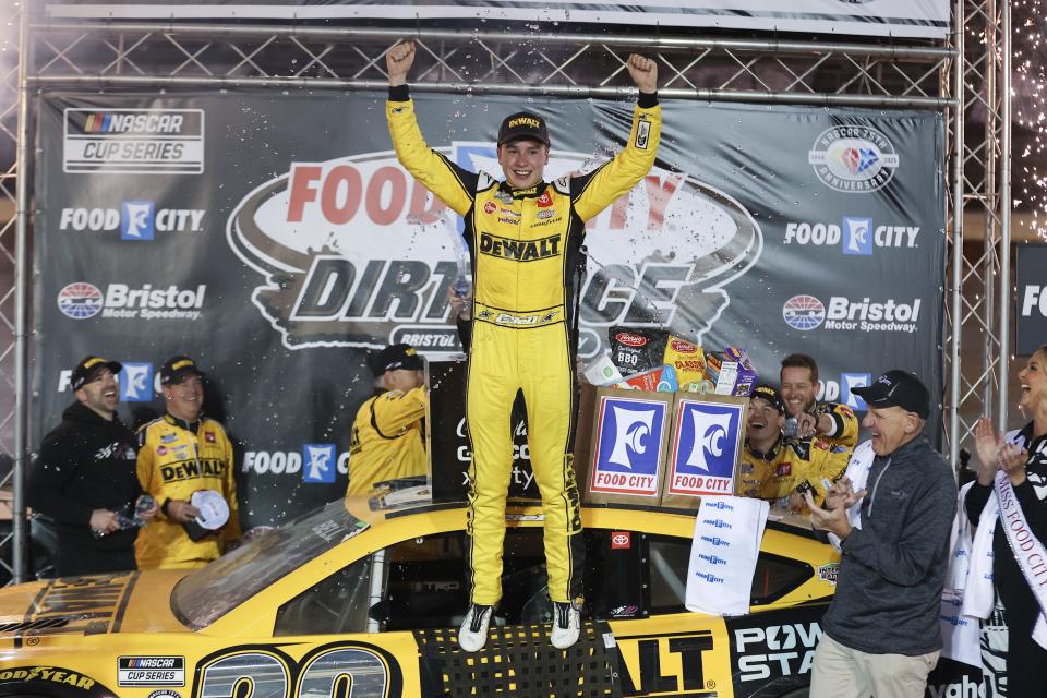 Christopher Bell celebrates after winning the Food City Dirt Race, Sunday night at the Bristol Motor Speedway.