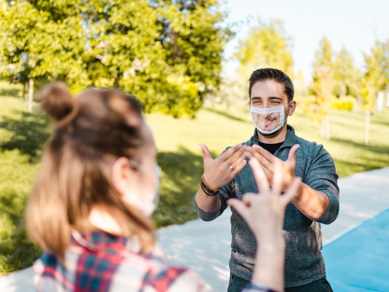 While not as widely available as cloth face coverings, you can find transparent face masks online: iStock