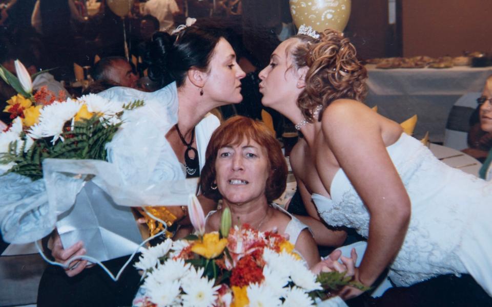 Jo Harrigan's mum Sylvia Wilding (centre) with Jo (right) and her sister Tammy Phillips (left) at Jo's wedding in 2008