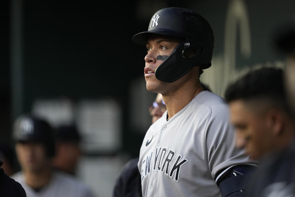 New York Yankees' Aaron Judge stands in the dugout before the team's baseball game against the Texas Rangers, Thursday, April 27, 2023, in Arlington, Texas. (AP Photo/Tony Gutierrez)