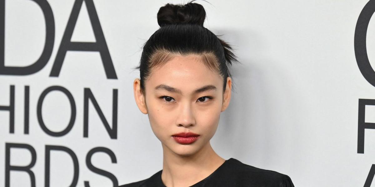 Model Hoyeon Jung walks on the runway during the Chanel Fashion