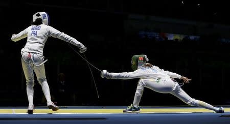 2016 Rio Olympics - Fencing - Quarterfinal - Women's Epee Individual Quarterfinals - Carioca Arena 3 - Rio de Janeiro, Brazil - 06/08/2016. Lauren Rembi (FRA) of France competes with Nathalie Moellhausen (BRA) of Brazil. REUTERS/Issei Kato