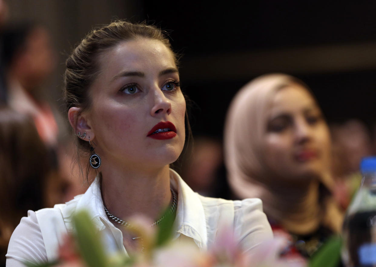 Amber Heard donates divorce proceeds to charity (AP)