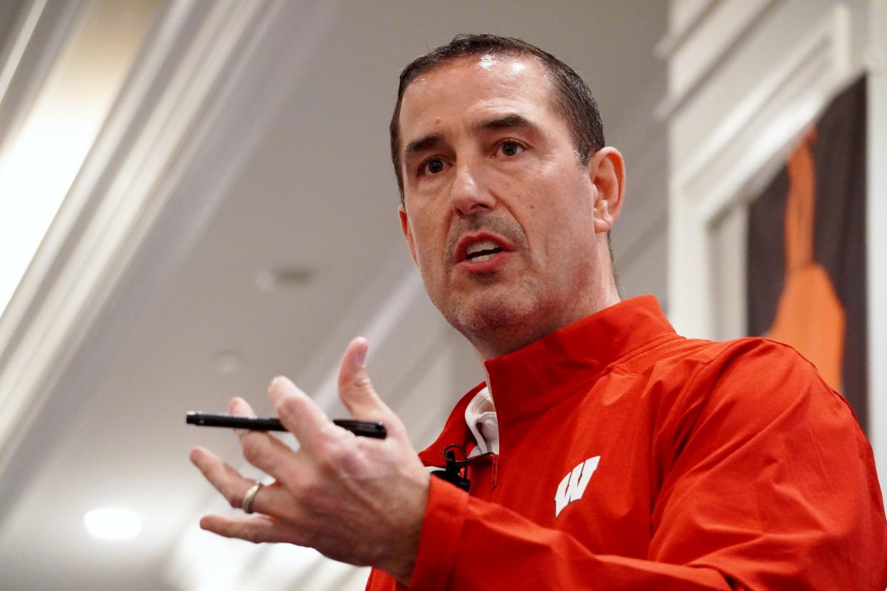 Wisconsin football coach Luke Fickell speaks to the Ohio High School Football Coaches Association Clinic at the Easton Hilton on Feb. 3, 2023.