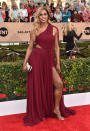 <p>Nominated with cast of the <i>Orange Is the New Black, </i>Laverne Cox attended the SAG Awards in a burgundy gown with cutouts and dramatic draping. Speaking of dramatic, she took the time to get political on the red carpet and gave a shoutout to the people of Flint, Michigan, also calling for the town’s governor to resign. <i>Photo: AP</i></p>