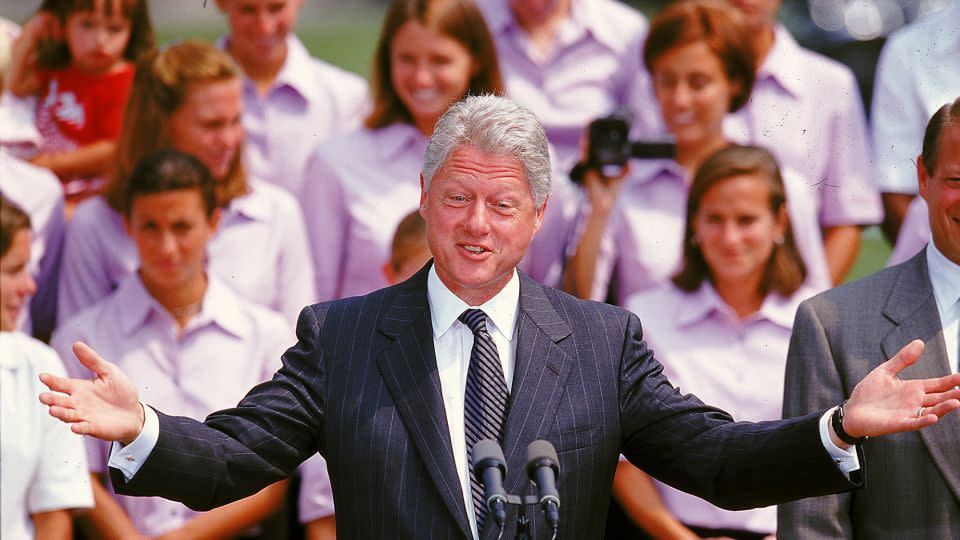 Then President Bill Clinton congratulates the US squad at the White House after winning the 1999 FIFA Women's World Cup. - Vincent Laforet/Getty Images