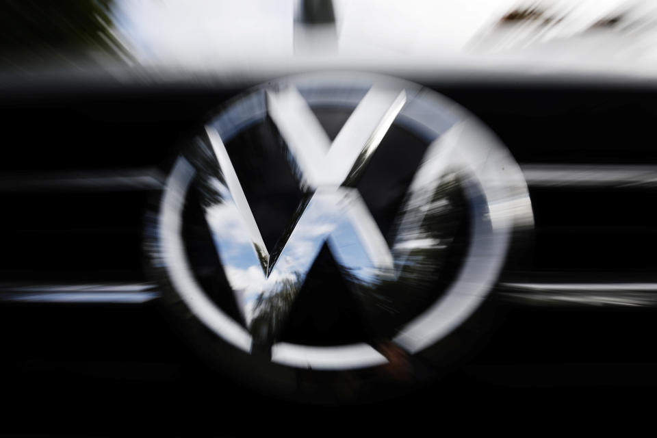 The VW logo is seen at the site of the first hearing of a consumer group's class action suit on behalf of Volkswagen owners against VW over the diesel emissions cheating scandal, at the Higher Regional Court in Braunschweig, Germany, September 30, 2019.     REUTERS/Michele Tantussi