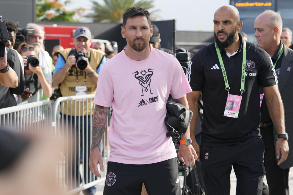 Inter Miami forward Lionel Messi, front left, arrives before a Leagues Cup soccer match against Cruz Azul, Friday, July 21, 2023, in Fort Lauderdale, Fla. (AP Photo/Lynne Sladky)