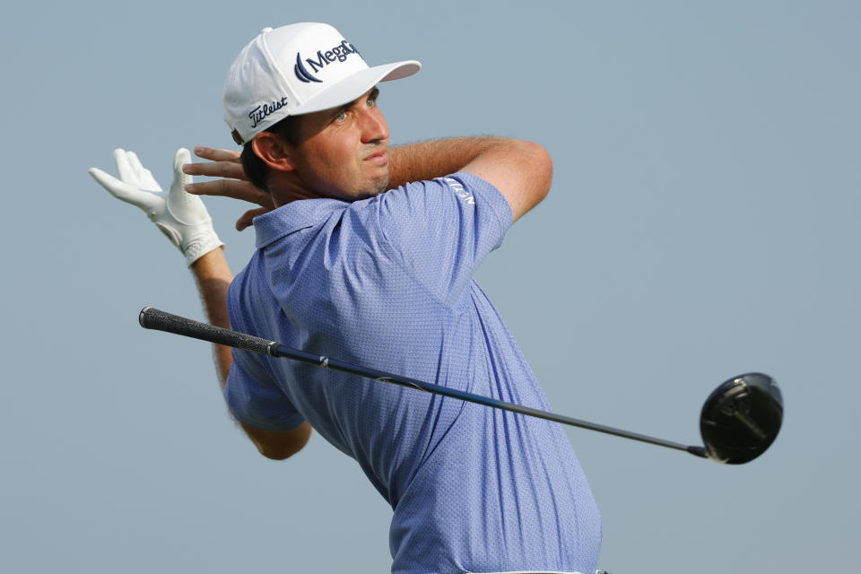 JT Poston leaves his driver on the 18th hole during the first round of the 3M Open golf tournament at Tournament Players Club on Thursday, July 27, 2023, in Blaine, Minnesota (AP Photo/Bruce Kluckhohn)