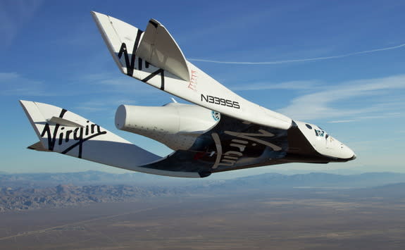 Virgin Galactic's first SpaceShipTwo spacecraft, the VSS Enterprise, glides over California's Mojave Air and Space Port in this view from a series of unpowered flight tests.