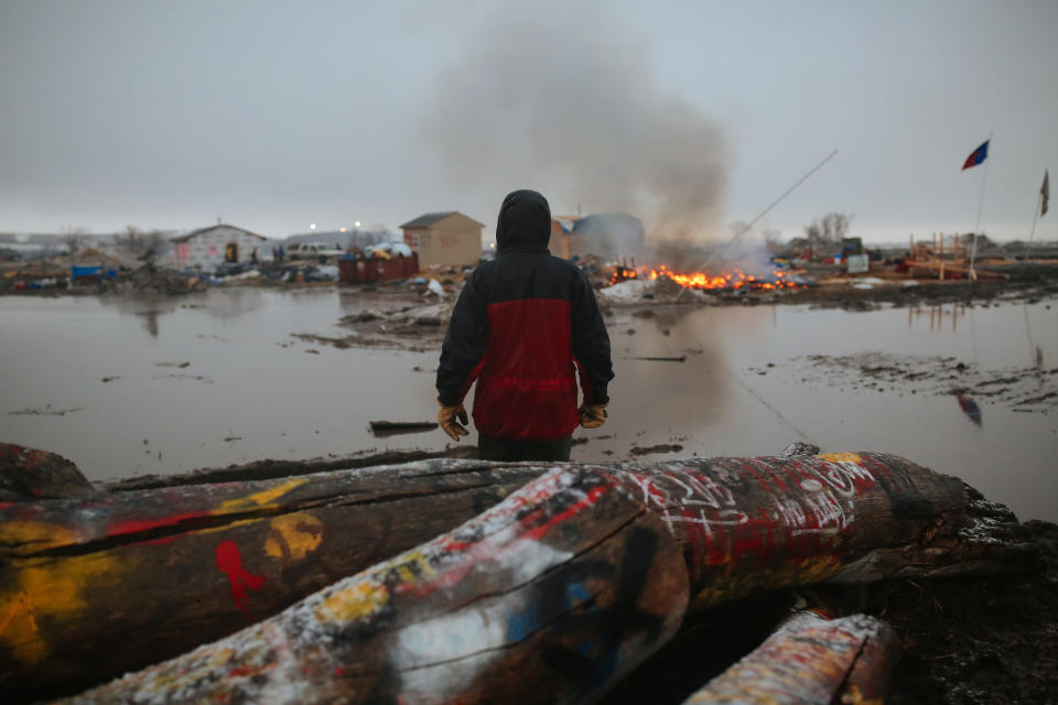 A demonstrator at the encampment opposing the construction of the Dakota Access Pipeline in February 2017 as federal officials ordered activists to leave. (Photo: Stephen Yang via Getty Images)