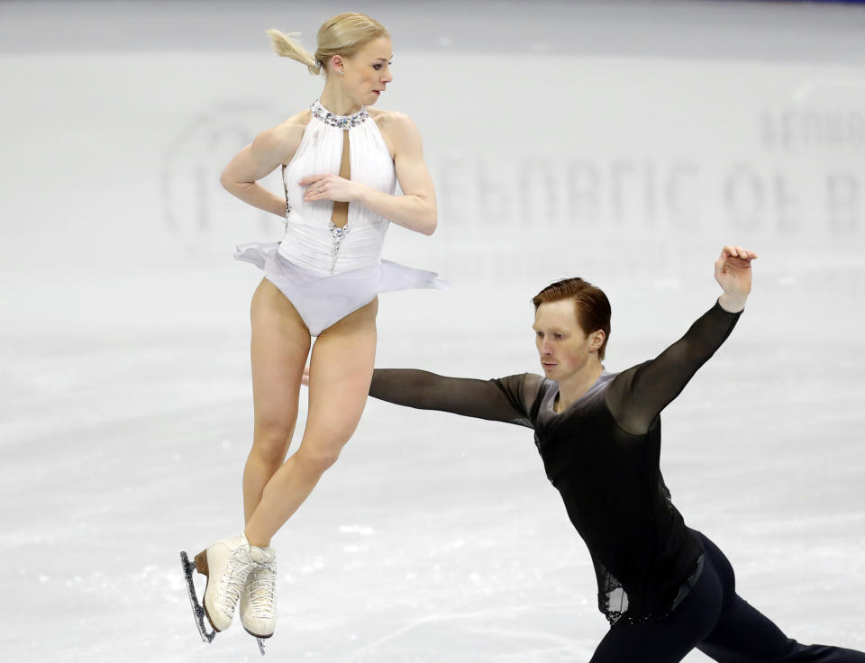 Evgenia Tarasova and Vladimir Morozov of Russia perform in the pairs free skating at the ISU European figure skating championships in Minsk, Belarus, Thursday, Jan. 24, 2019. (AP Photo/Sergei Grits)