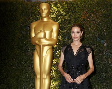 REFILE - UPDATING BYLINE Angelina Jolie arrives at the 5th Annual Academy of Motion Picture Arts and Sciences Governors Awards in Hollywood November 16, 2013. Jolie is being honored with the Jean Hersholt Humanitarian Award, which is an Oscar statuette at the ceremony. REUTERS/Fred Prouser