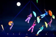 LONDON, ENGLAND - AUGUST 29: Artists perform with umbrellas during the Opening Ceremony of the London 2012 Paralympics at the Olympic Stadium on August 29, 2012 in London, England. (Photo by Dan Kitwood/Getty Images)