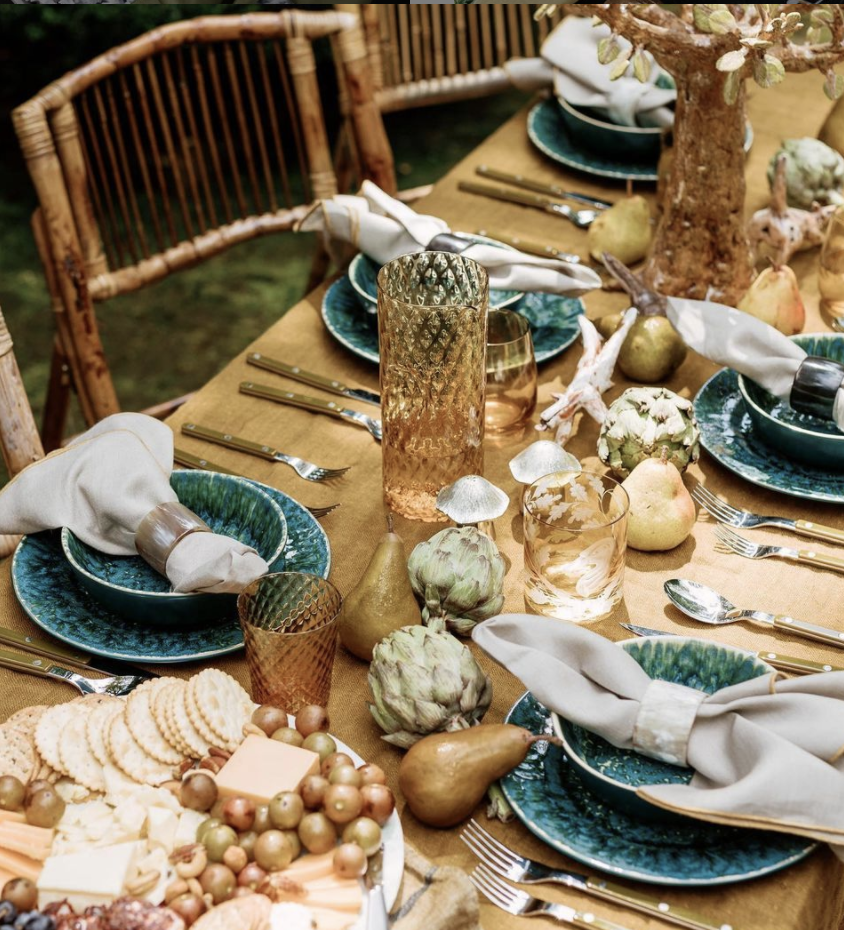 <p>An ochre tablecloth with textural artichokes, golden pears, and silver mushrooms make for a dreamy tablescape by <a href="https://go.redirectingat.com?id=74968X1596630&url=https%3A%2F%2Falkmy.myshopify.com%2F&sref=https%3A%2F%2Fwww.veranda.com%2Fluxury-lifestyle%2Fentertaining%2Fg33567880%2Fthanksgiving-centerpieces%2F" rel="nofollow noopener" target="_blank" data-ylk="slk:Alkmy;elm:context_link;itc:0;sec:content-canvas" class="link ">Alkmy</a>. </p>