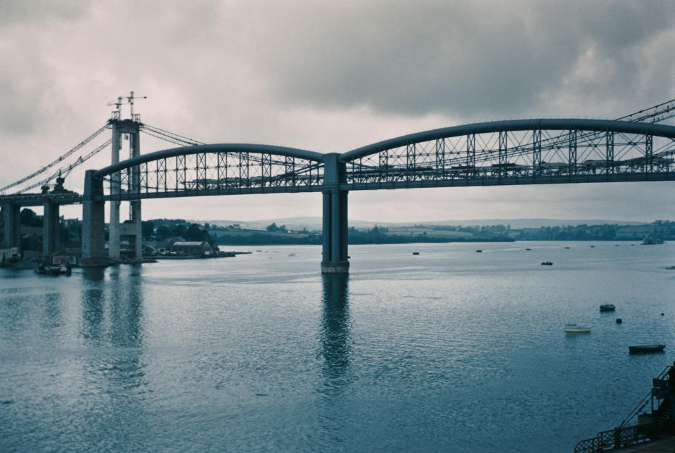 The Royal Albert Bridge (foreground) and Tamar Bridge (background) over the River Tamar in Saltash, between Cornwall and Devon, UK, June 1961. The Royal Albert Bridge was designed by Isambard Kingdom Brunel in the mid 19th century. (Photo by Garry Hogg/Getty Images)