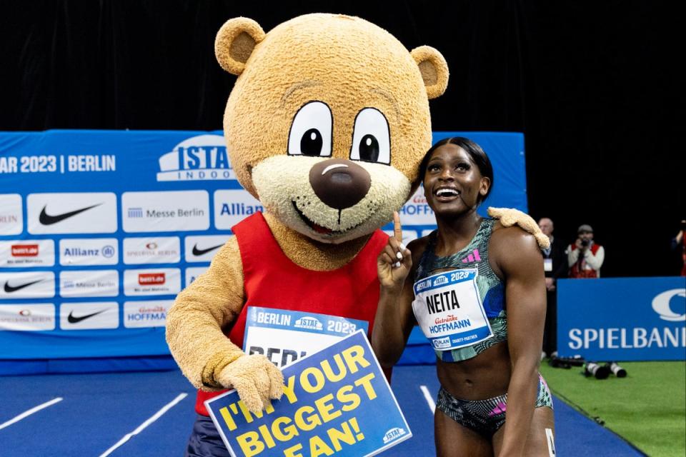 All smiles: Daryll Neita celebrates winning the 60m title in Berlin  (Getty Images)